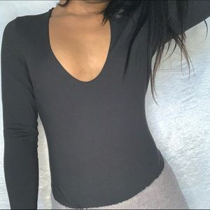 Black super soft low scoop body suit from Free People.